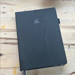 Black Notebook with Logo